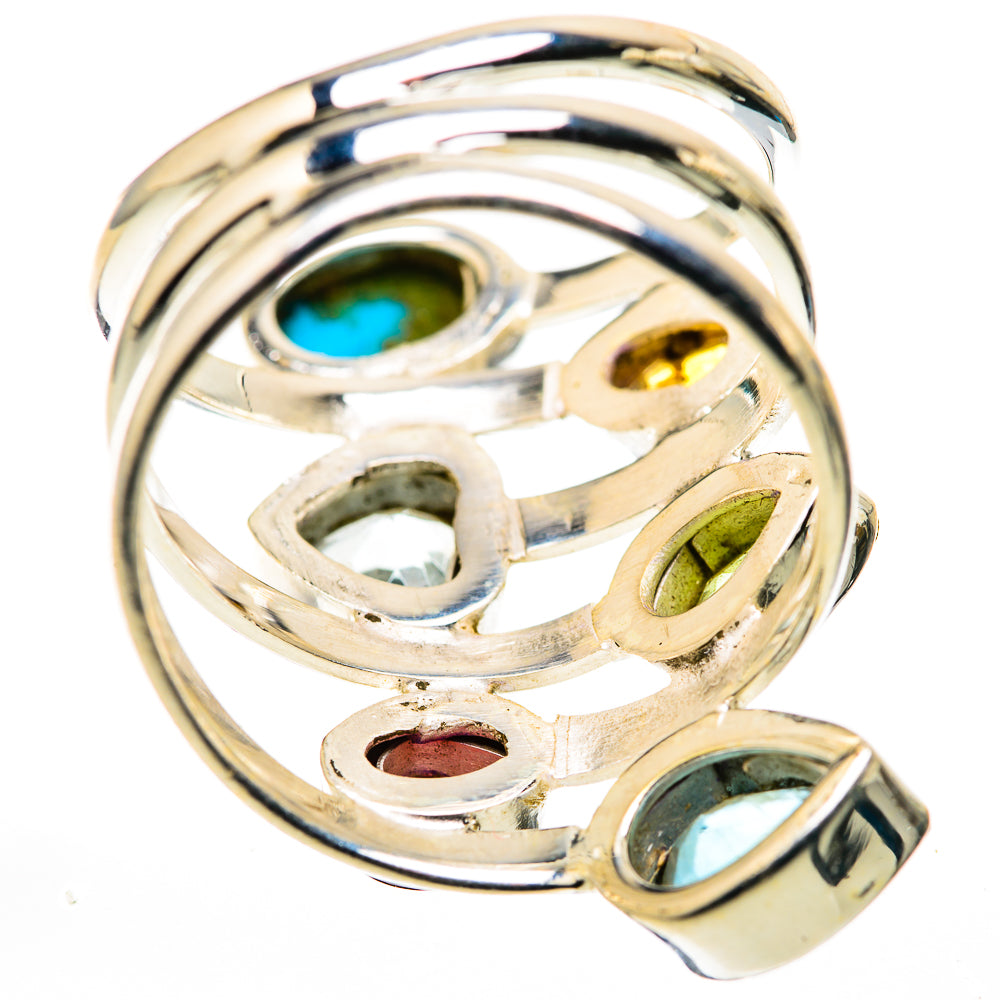 Sterling silver multi-gemstone ring, showing round blue center and bezel-set colored gems