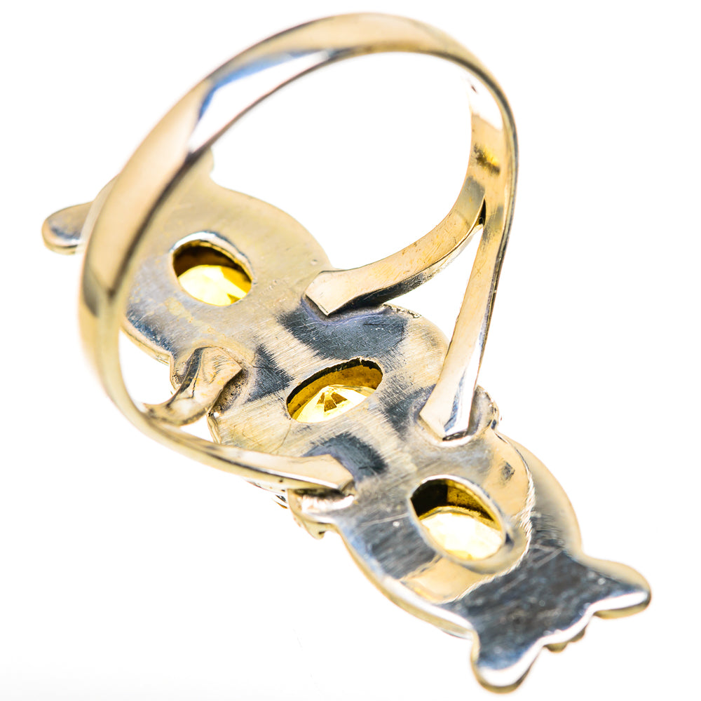Sterling silver citrine ring underside with oval cutouts and openwork metal frame