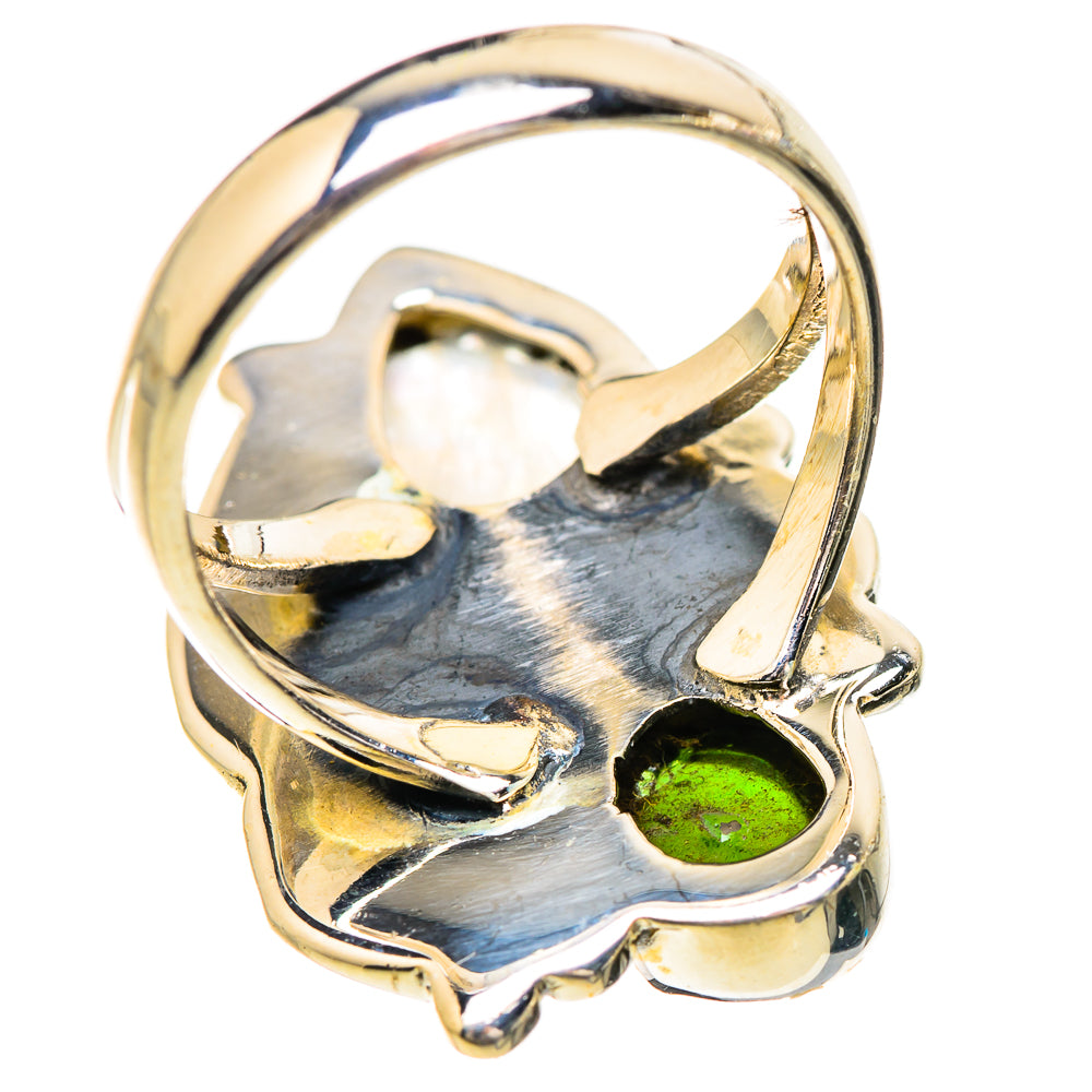 Polished sterling silver ring band with moonstone and green stone setting, openwork detail