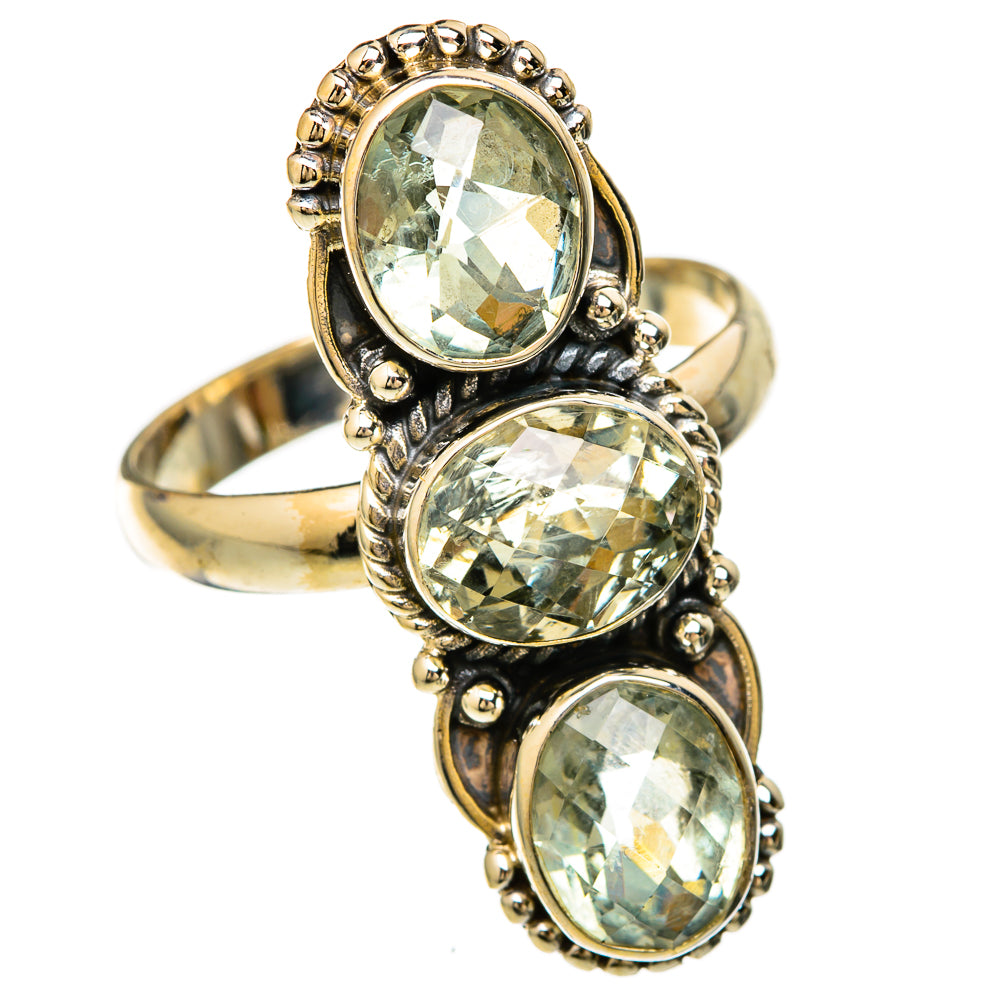 Faceted green amethyst three-stone ring with oval stones, gold-tone bezel setting