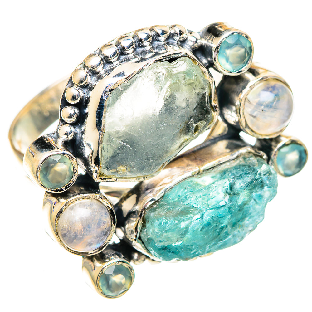 Multi-stone sterling silver ring with large green cabochon and small round opal-like stones