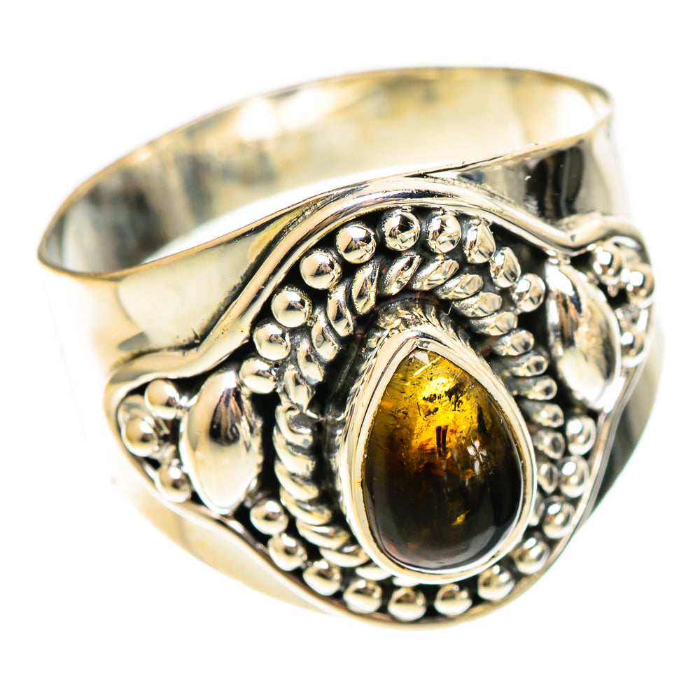 Sterling silver ring with yellow oval gemstone and ornate beaded side detailing