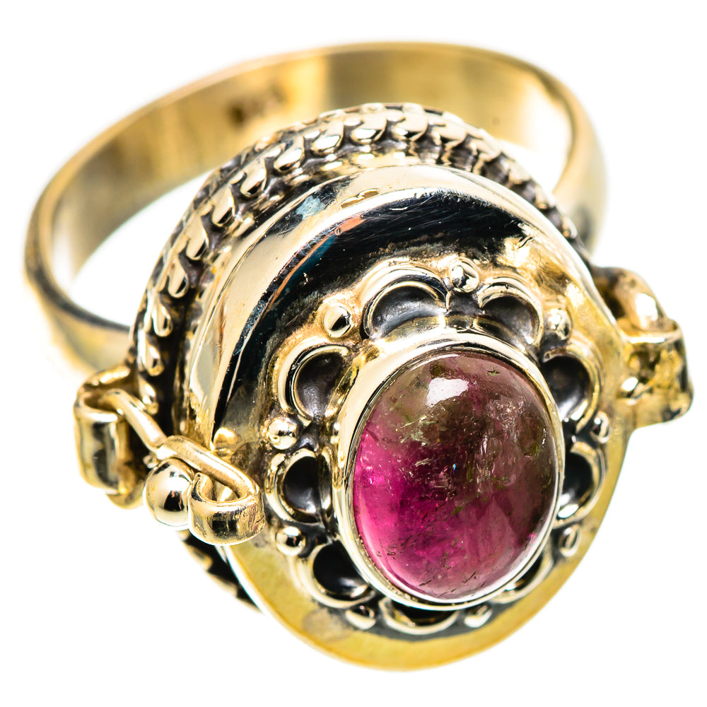 Sterling silver ring with oval pink tourmaline center and ornate bezel setting