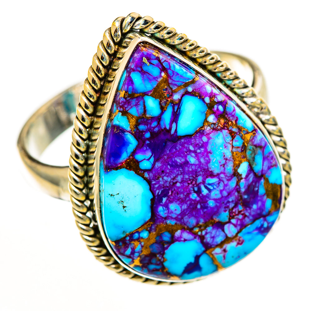 Teardrop turquoise inlay ring with purple-blue stone and ornate braided gold-tone bezel