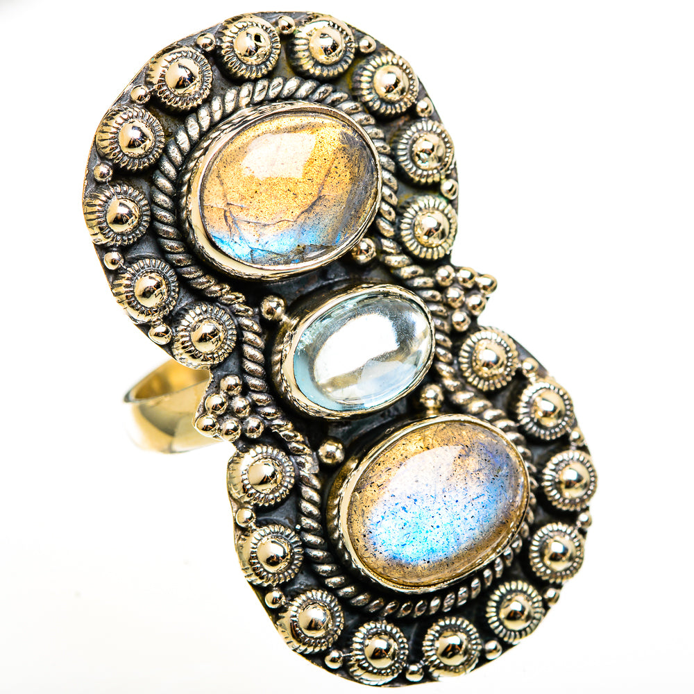Sterling silver statement ring with three oval gemstones, blue flash, beaded round bezel