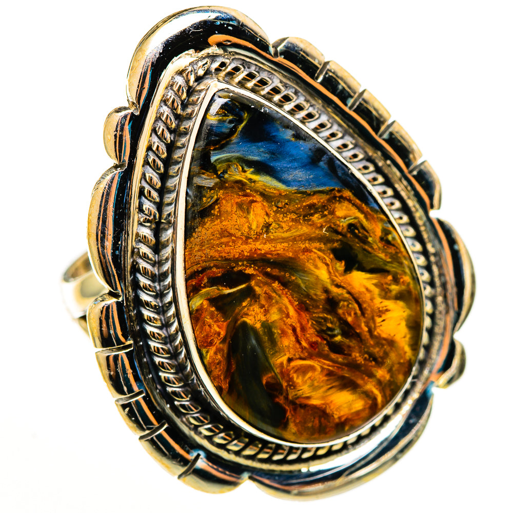 Oval pietersite cabochon ring with ornate silver frame and gold-toned stone
