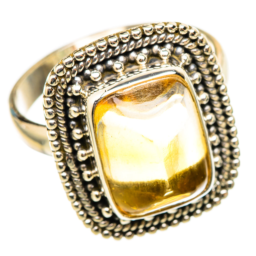 Sterling silver citrine sugarloaf ring, textured scalloped border and yellow gem face