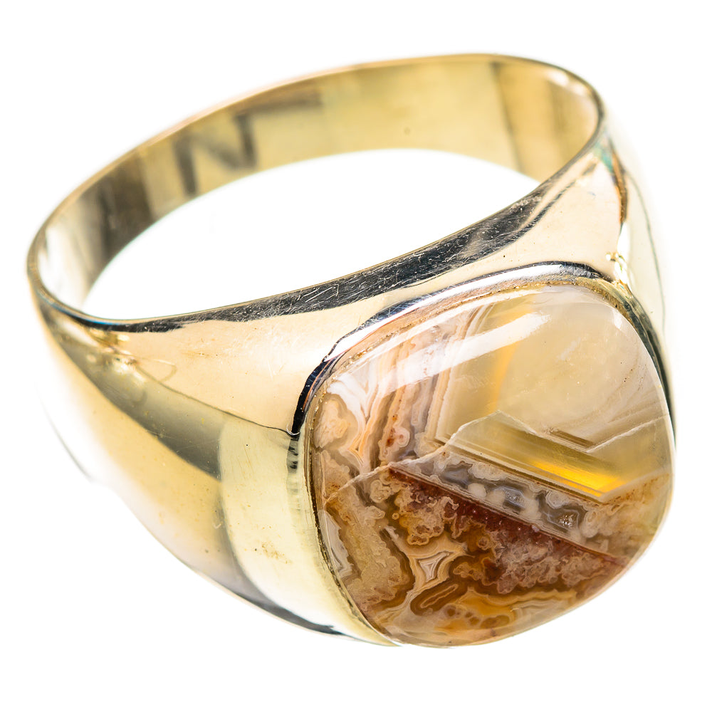 Polished silver-tone ring with oval agate gemstone centerpiece in tan and amber tones