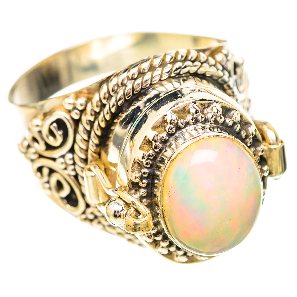 Ornate silver-tone ring with round iridescent opal bezel and swirl beadwork setting