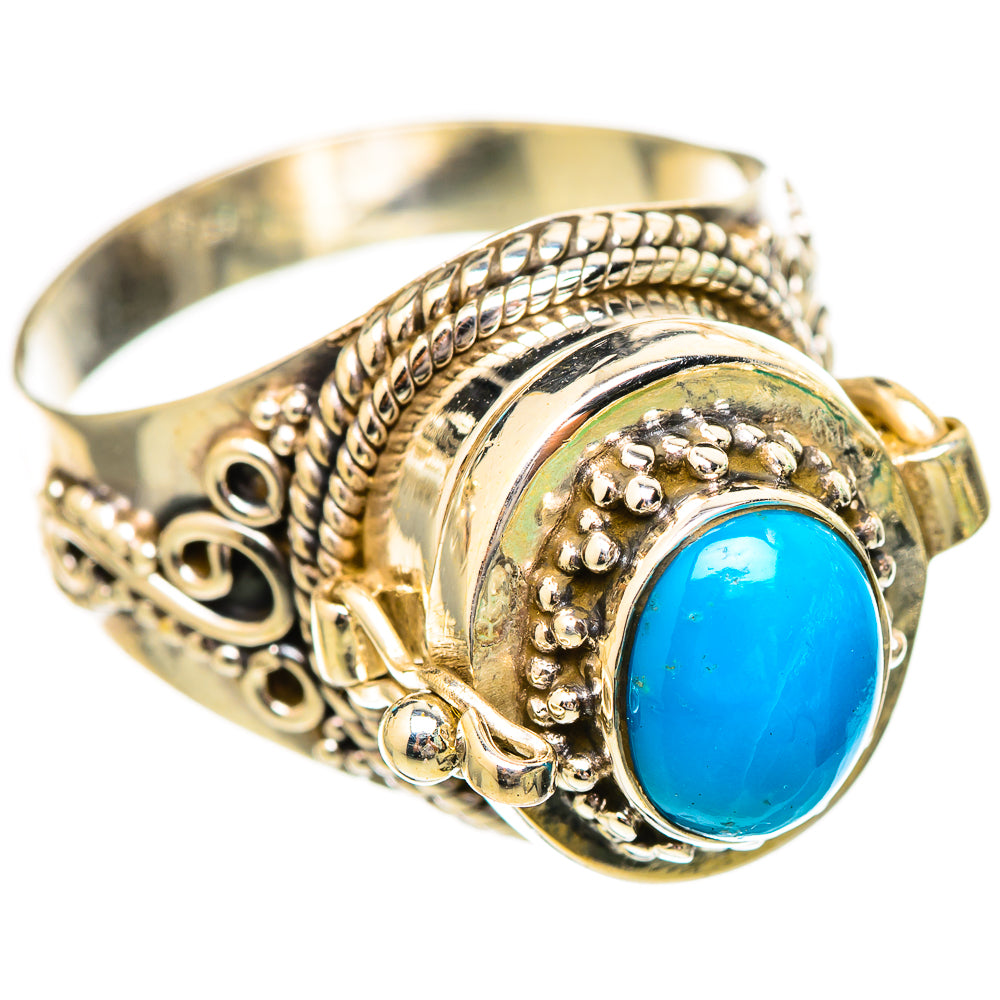 Turquoise cabochon sterling silver ring with detailed scrollwork and twisted shank
