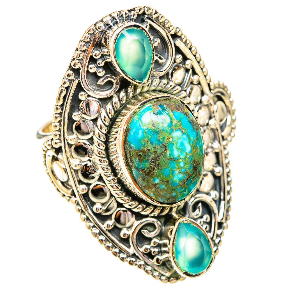 Filigree sterling silver ring with central turquoise oval cabochon and two side turquoise stones