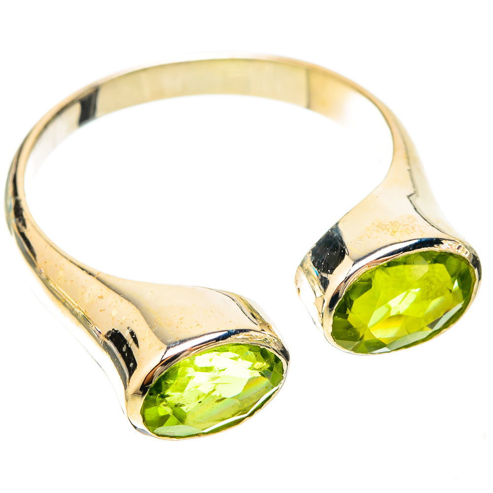 925 sterling silver ring with two oval green peridot gemstones on a split band