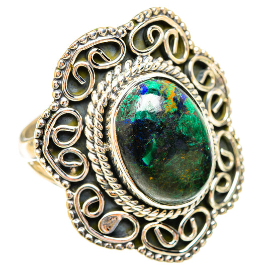 Sterling silver ring with oval green-blue stone and ornate filigree bezel