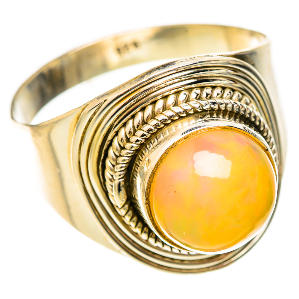 925 sterling silver opal ring with oval orange-yellow cabochon and braided bezel, size 10