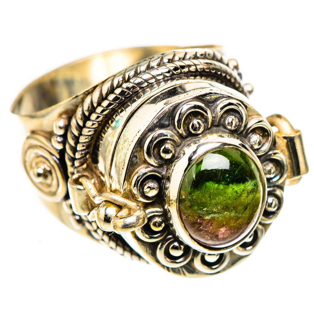 Sterling silver ring with green tourmaline cabochon and ornate filigree band