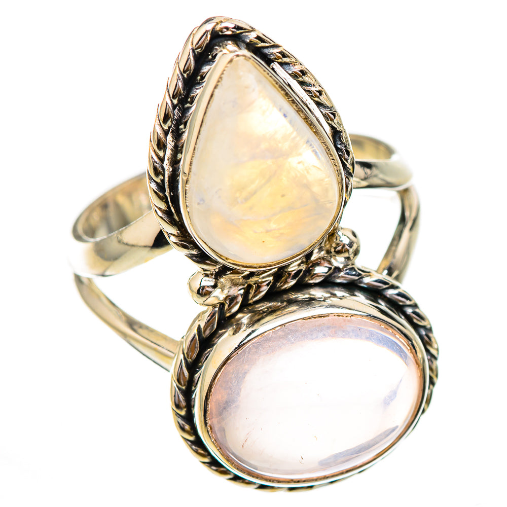 Two-stone sterling silver ring with stacked iridescent and pale teardrop cabochons, ornate setting