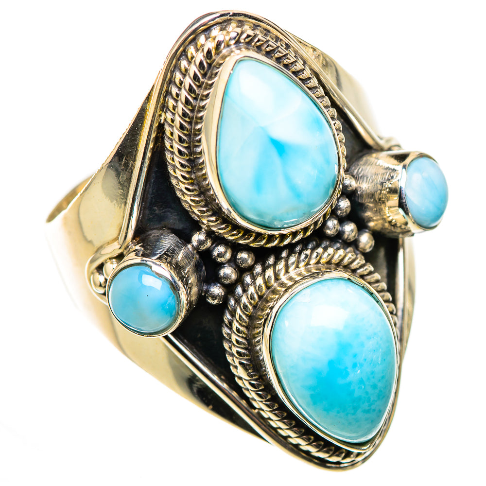 Sterling silver ring with oval larimar cabochons, rope bezels, and round side stone