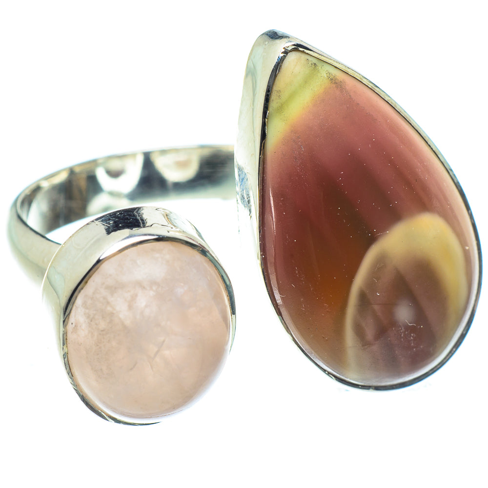 Sterling silver adjustable ring with large oval rose quartz cabochon bezel