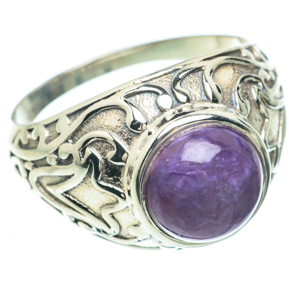 Sterling silver statement ring with round purple cabochon and carved ornamental band