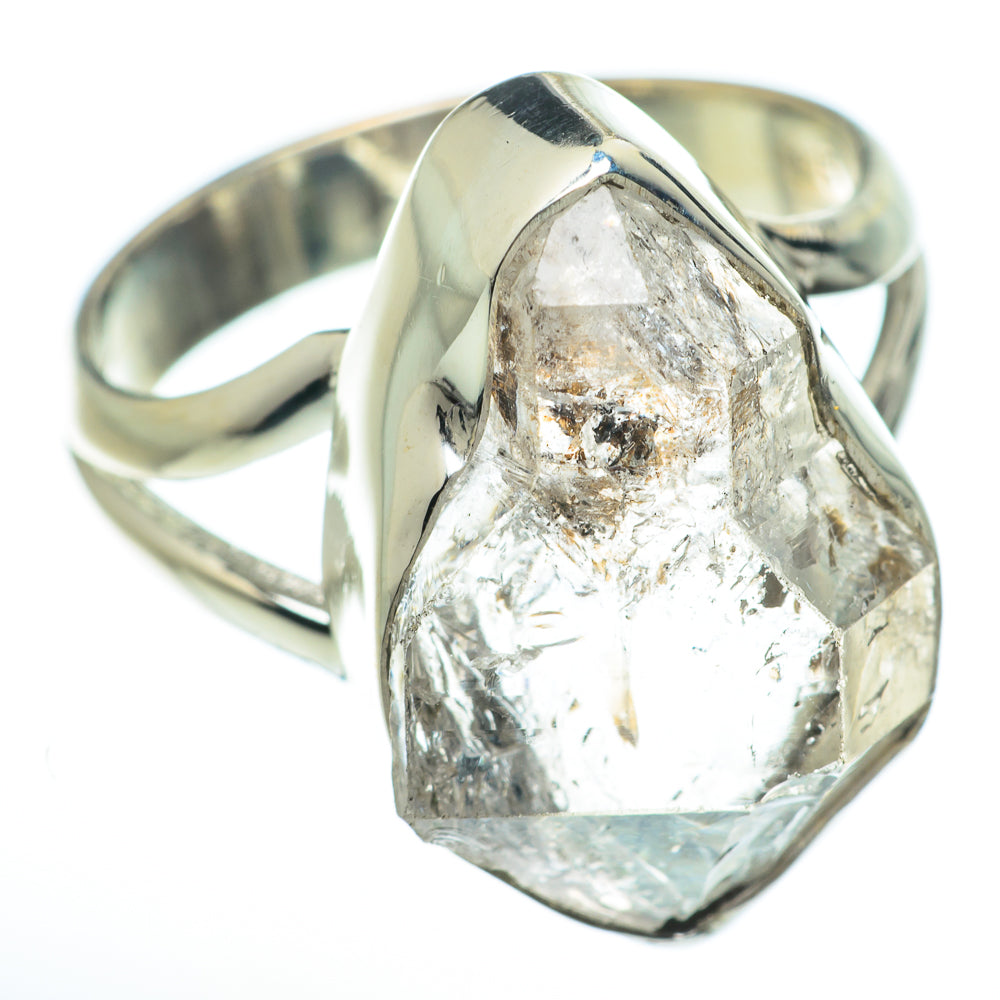 Sterling silver gemstone ring with faceted clear stone and polished band