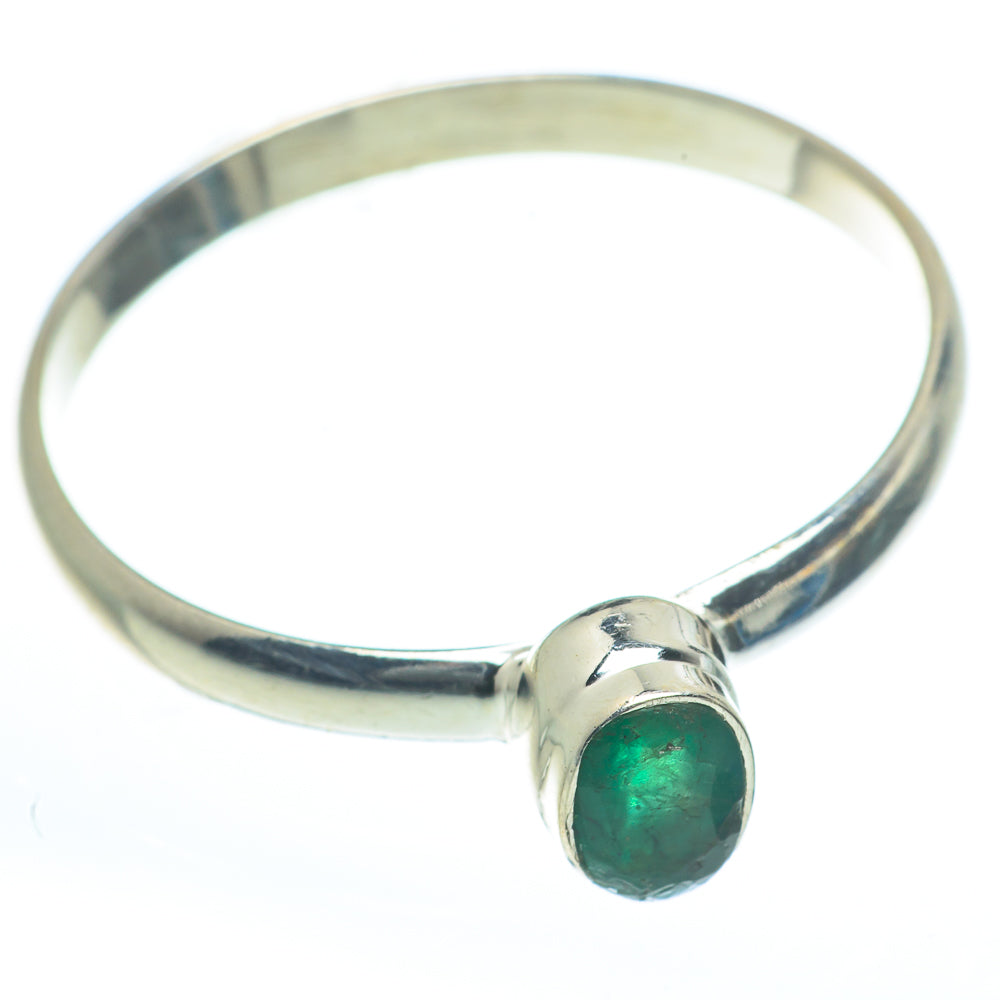 Sterling silver ring with oval green gemstone bezel set