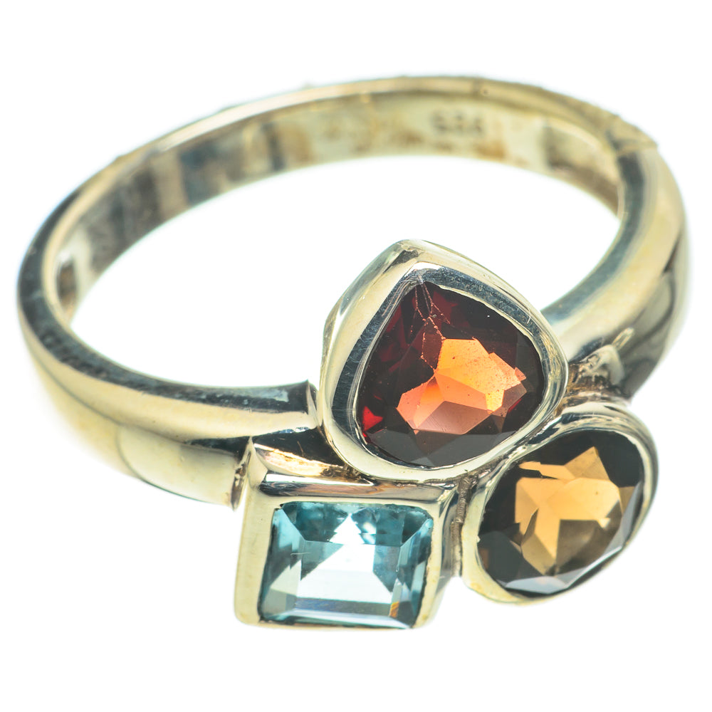 Sterling silver gemstone ring with red oval, blue square, and amber round stones