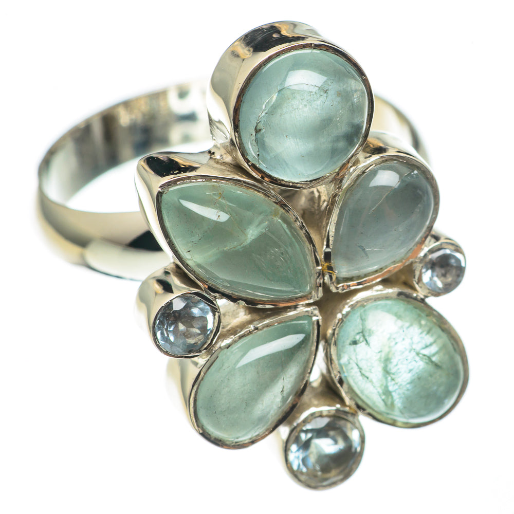 Sterling silver aquamarine teardrop cluster ring with blue topaz accent round stones