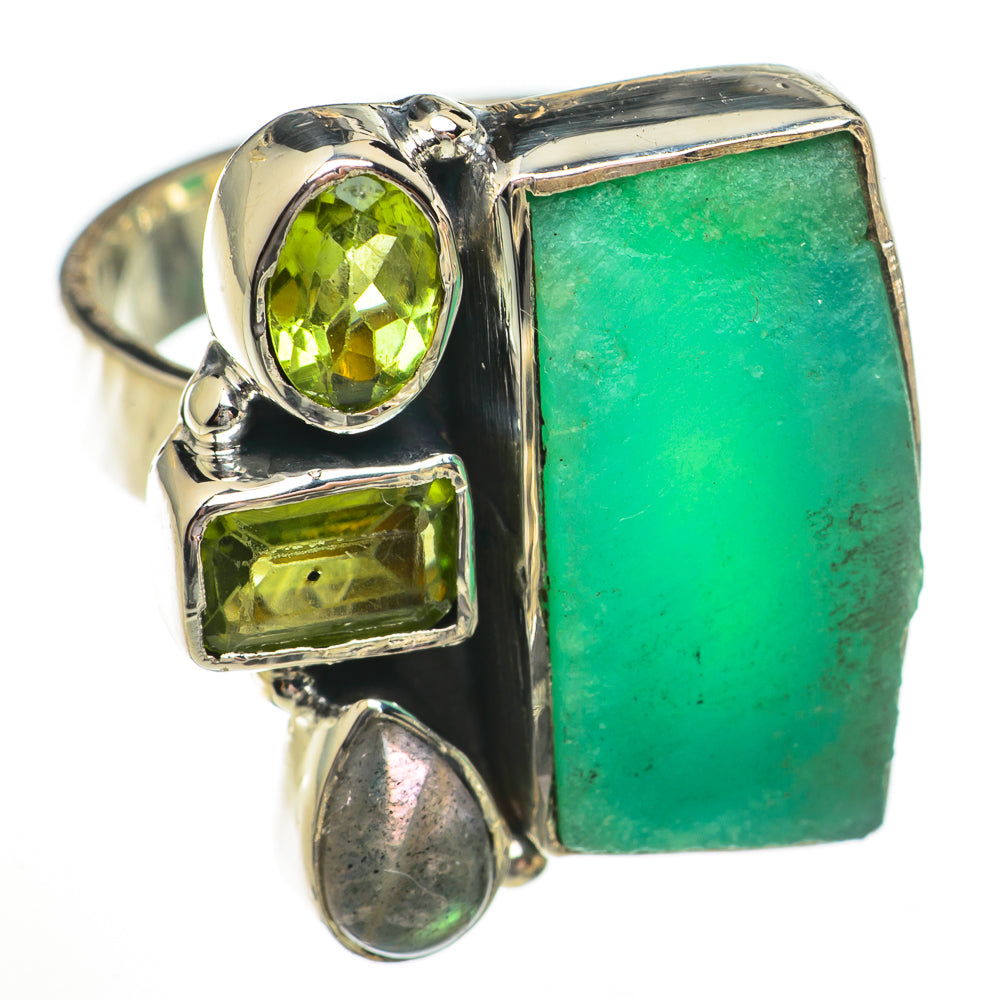 Sterling silver ring with big green square gemstone, round green center stone, and side accents