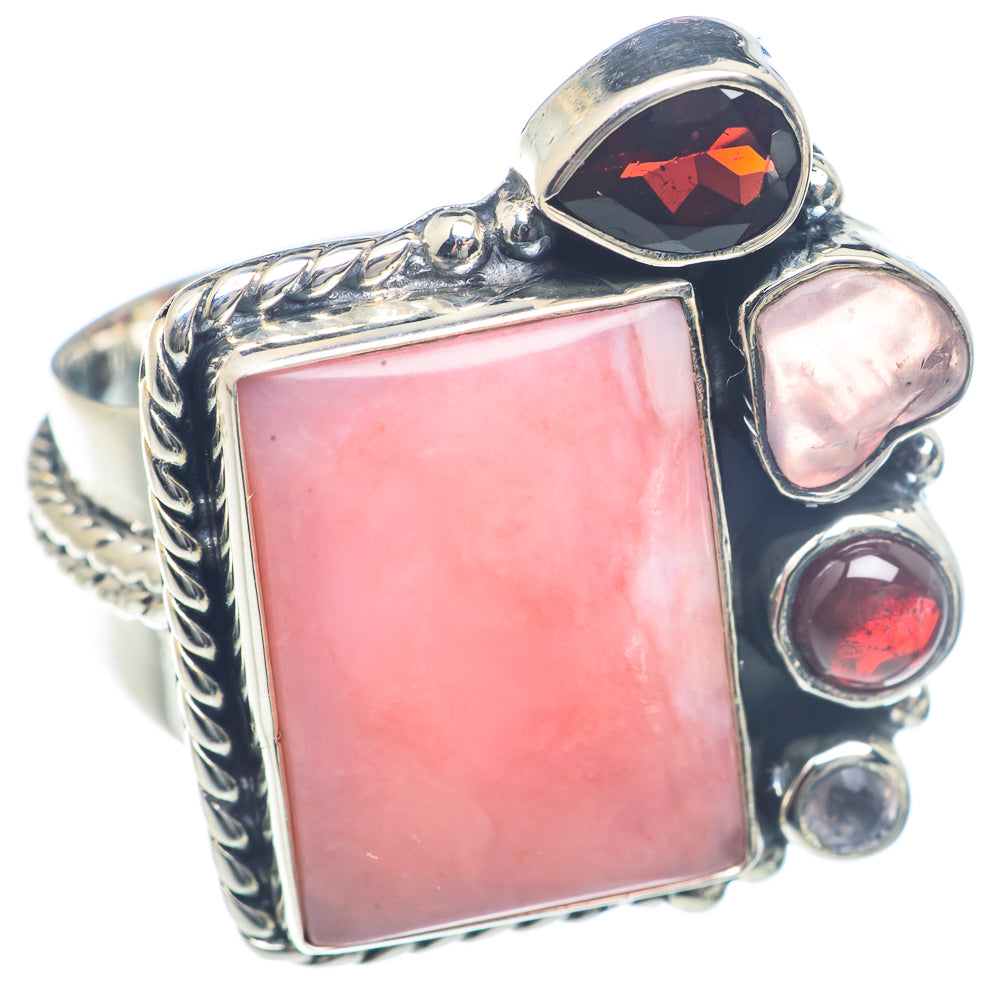 Sterling silver ring with pink rectangular gemstone, rope-textured band, prong-set accents
