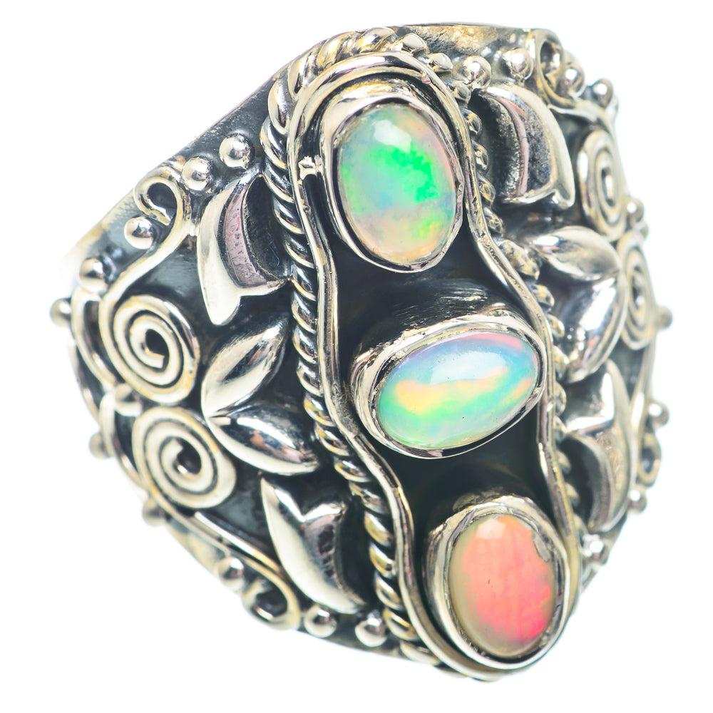 Sterling silver opal ring with three oval iridescent stones, green-blue-pink