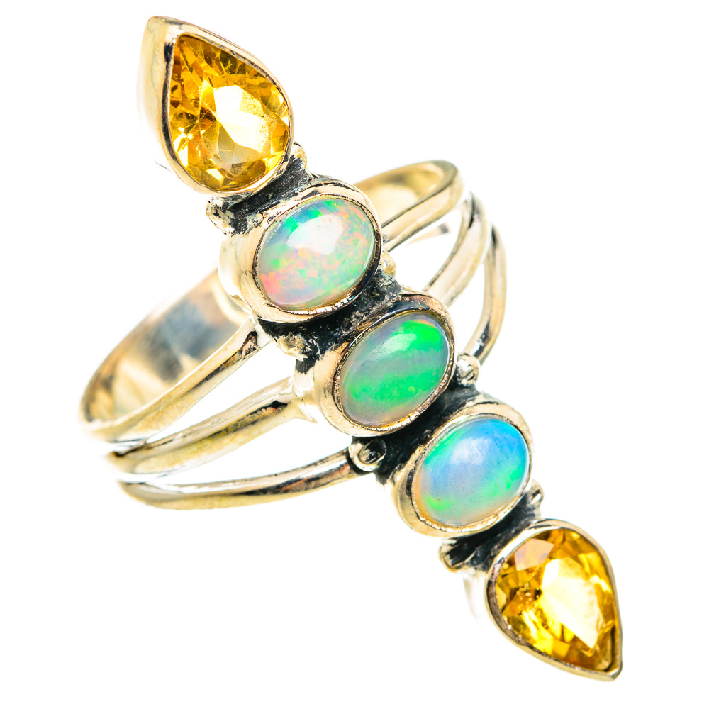 Sterling silver ring showing stacked opal cabochons with two yellow citrine accents