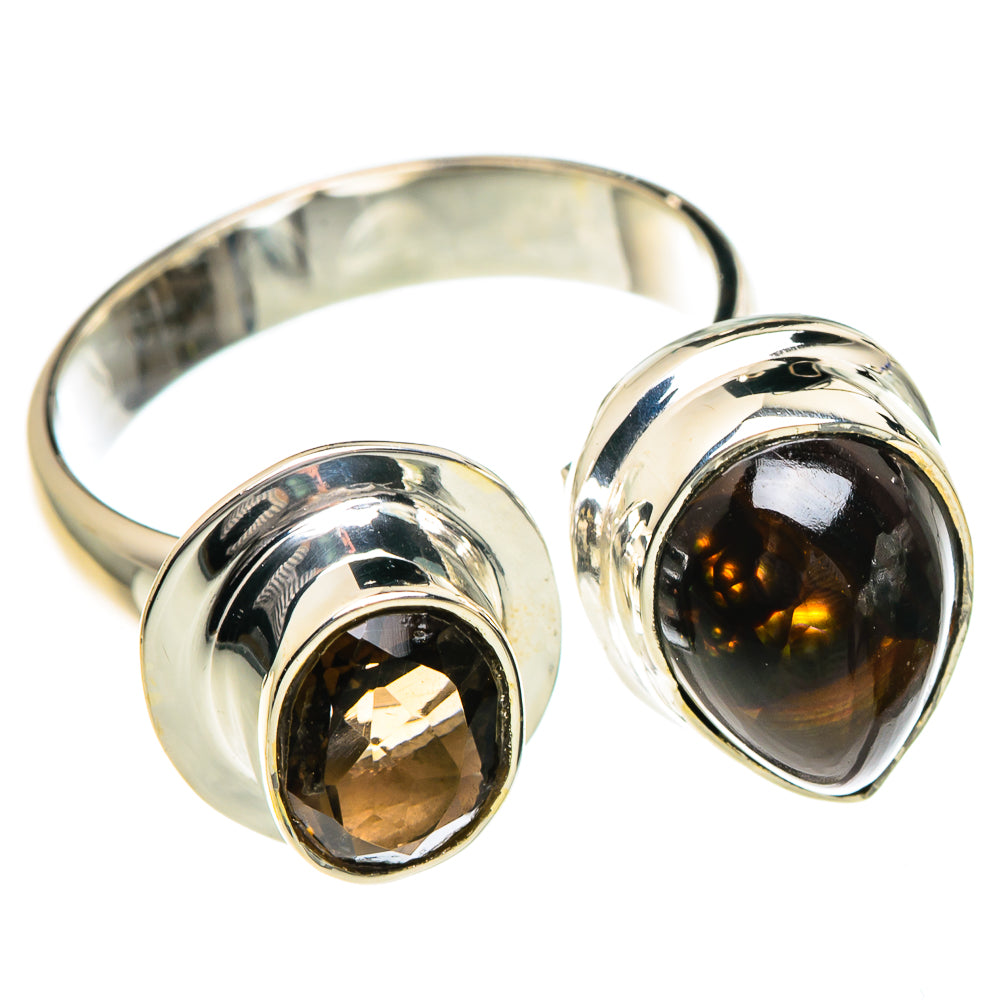 Sterling silver ring with oval dark brown gemstone and small round amber stone
