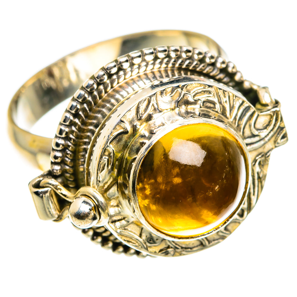 Sterling silver poison ring with round golden-yellow citrine and textured braided band