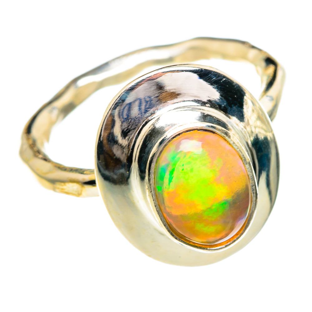 Oval opal ring in polished 925 sterling silver with green-orange iridescent center