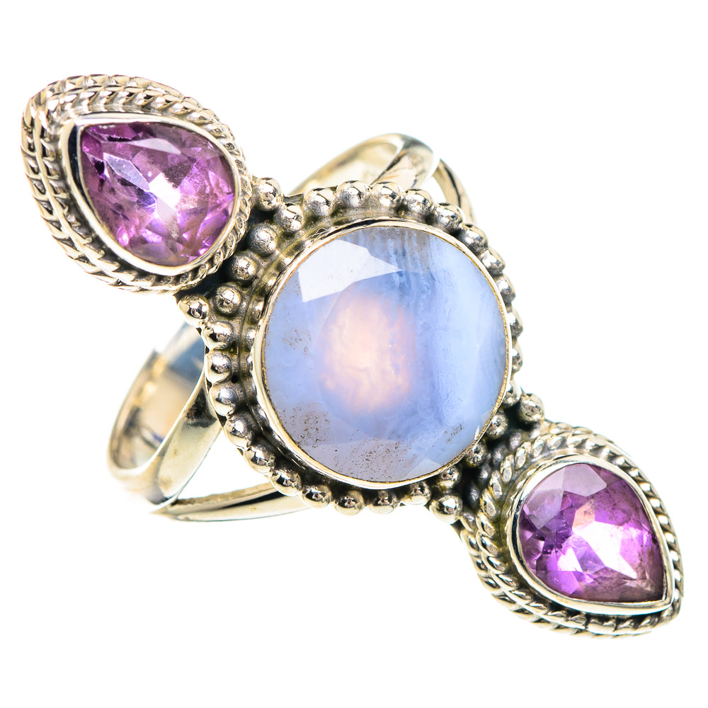 Sterling silver ring with pale blue oval cabochon and two purple teardrop stones