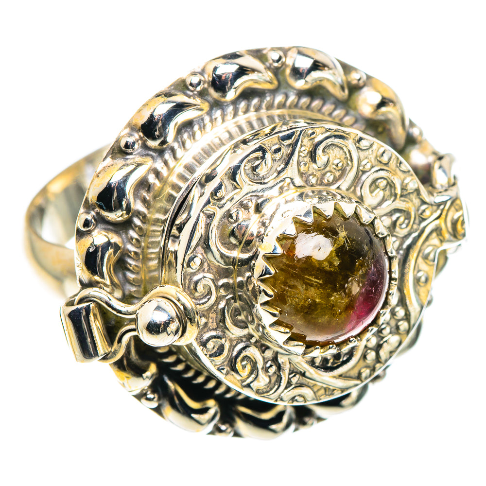 Sterling silver ornate ring with large oval yellow-brown gemstone bezel setting