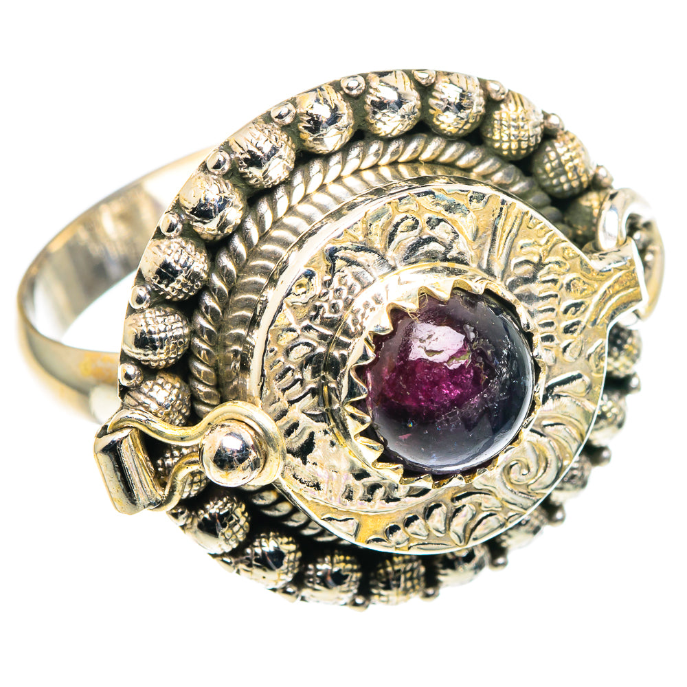 Sterling silver poison ring with large oval purple-pink tourmaline center and ornate beaded bezel