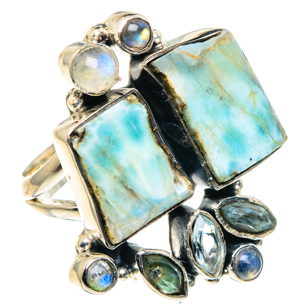 Sterling silver ring with large light-blue square-cut stones and small blue opalescent gems