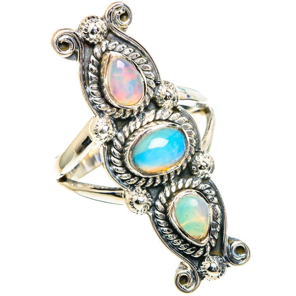 Sterling silver ring with three oval Ethiopian opal-style gemstones, ornate prong settings