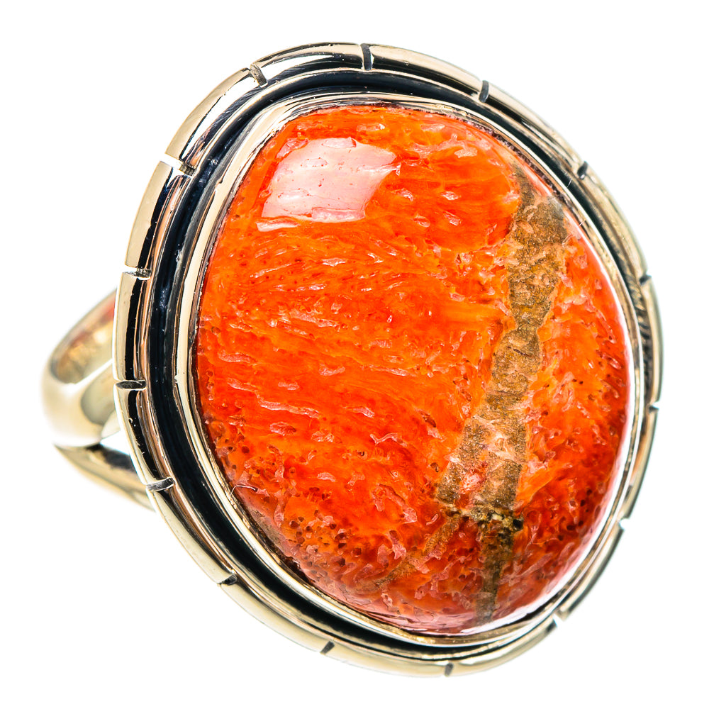 Oval sterling silver ring featuring orange sponge coral cabochon with brown veining