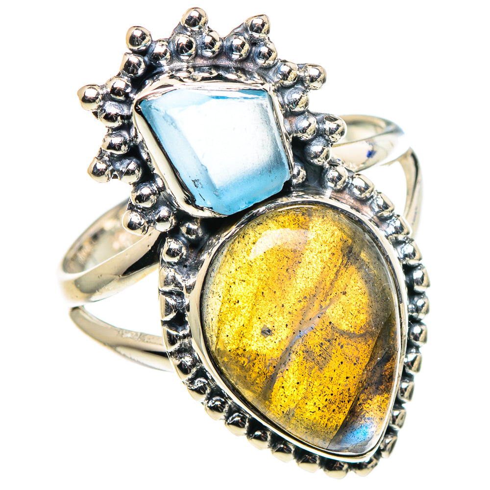 Sterling silver ring with blue top and yellow oval gemstone, beaded halo setting