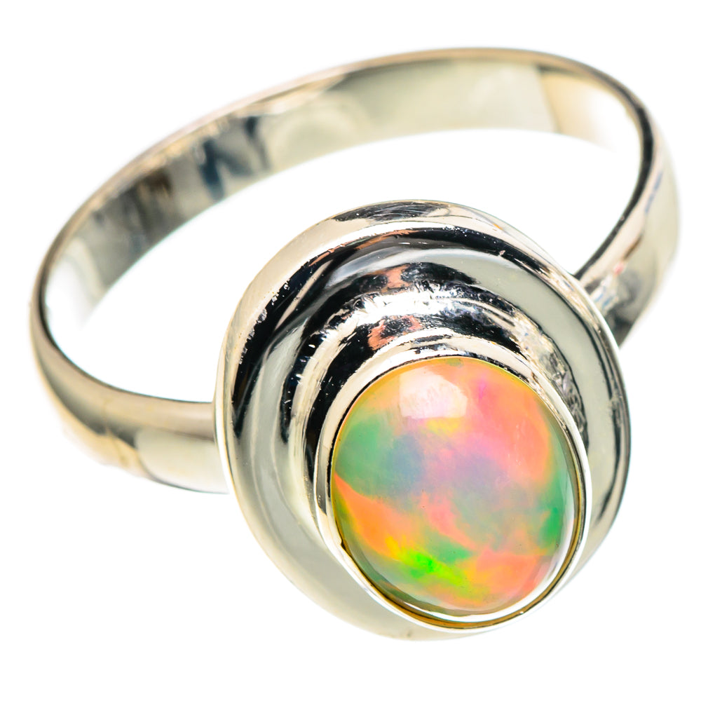 Sterling silver opal ring, round iridescent opal in raised bezel on band