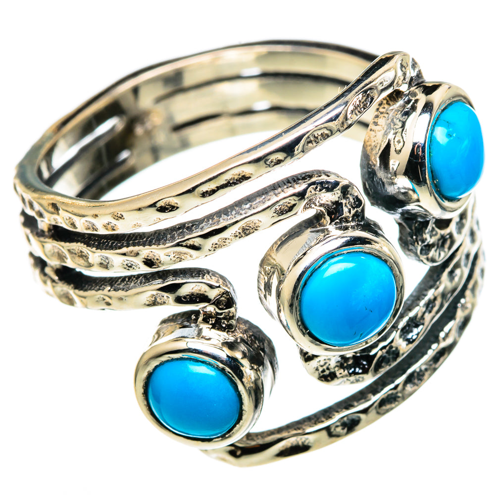 Turquoise cabochon silver ring with ornate swirl band and three blue stone settings