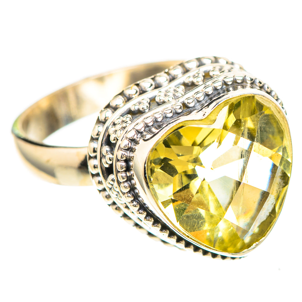 Sterling silver ring with oval lemon-yellow faceted quartz and beaded edge band