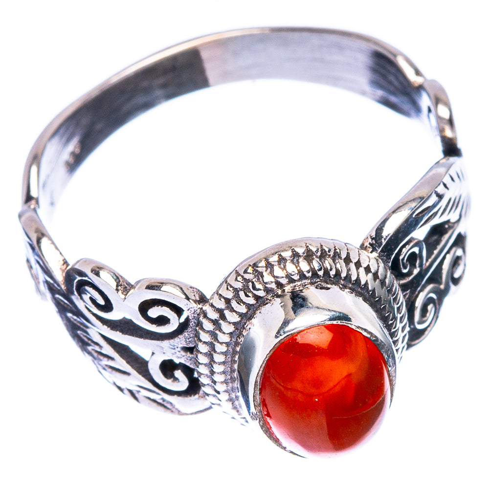 Sterling silver dainty ring with red carnelian cabochon and scrollwork band