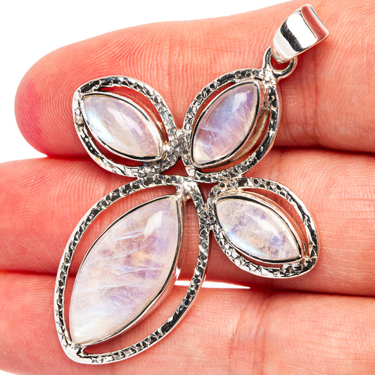 Sterling silver cross pendant with four pear-cut rainbow moonstone centers