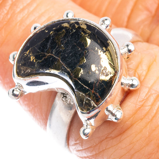 Sterling silver moon ring with black stone and gold flecks, open prong setting.