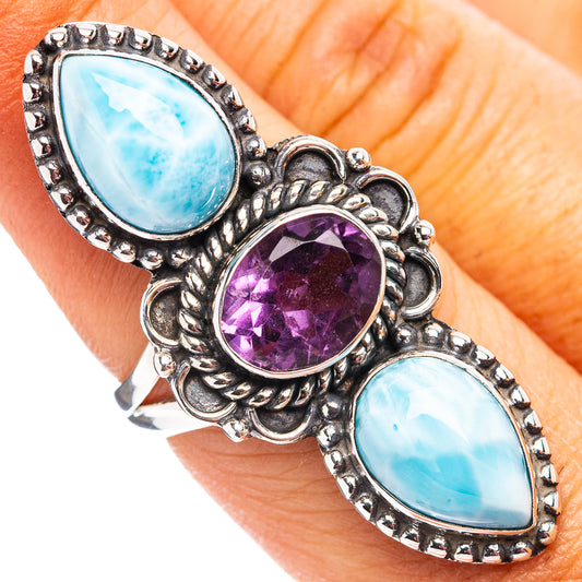 Sterling silver ring with oval blue larimar stones and purple amethyst center bezel