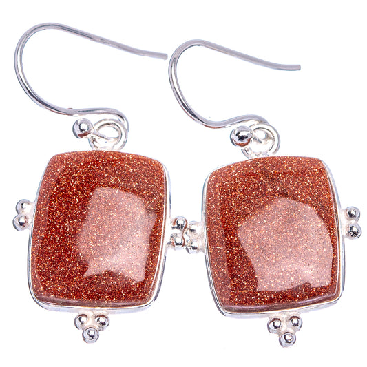 Goldstone earrings, square reddish glitter cabochons with silver-tone fishhook backs
