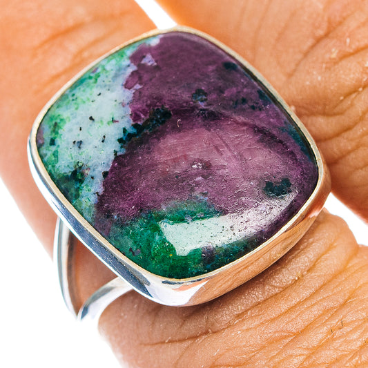 Sterling silver ring with oval purple-and-green gemstone cabochon, bezel set